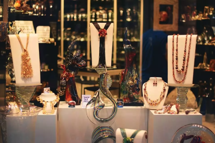 Retail display of jewellery standing on custom props.